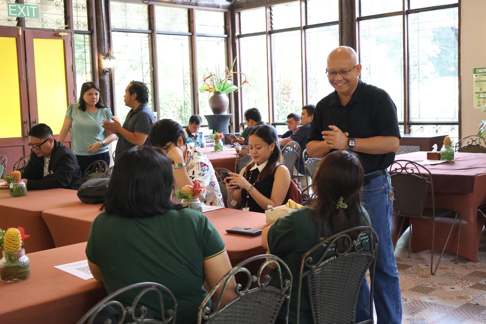 Attendees conversing during a break at the DALISAI 2.0 Inception Meeting