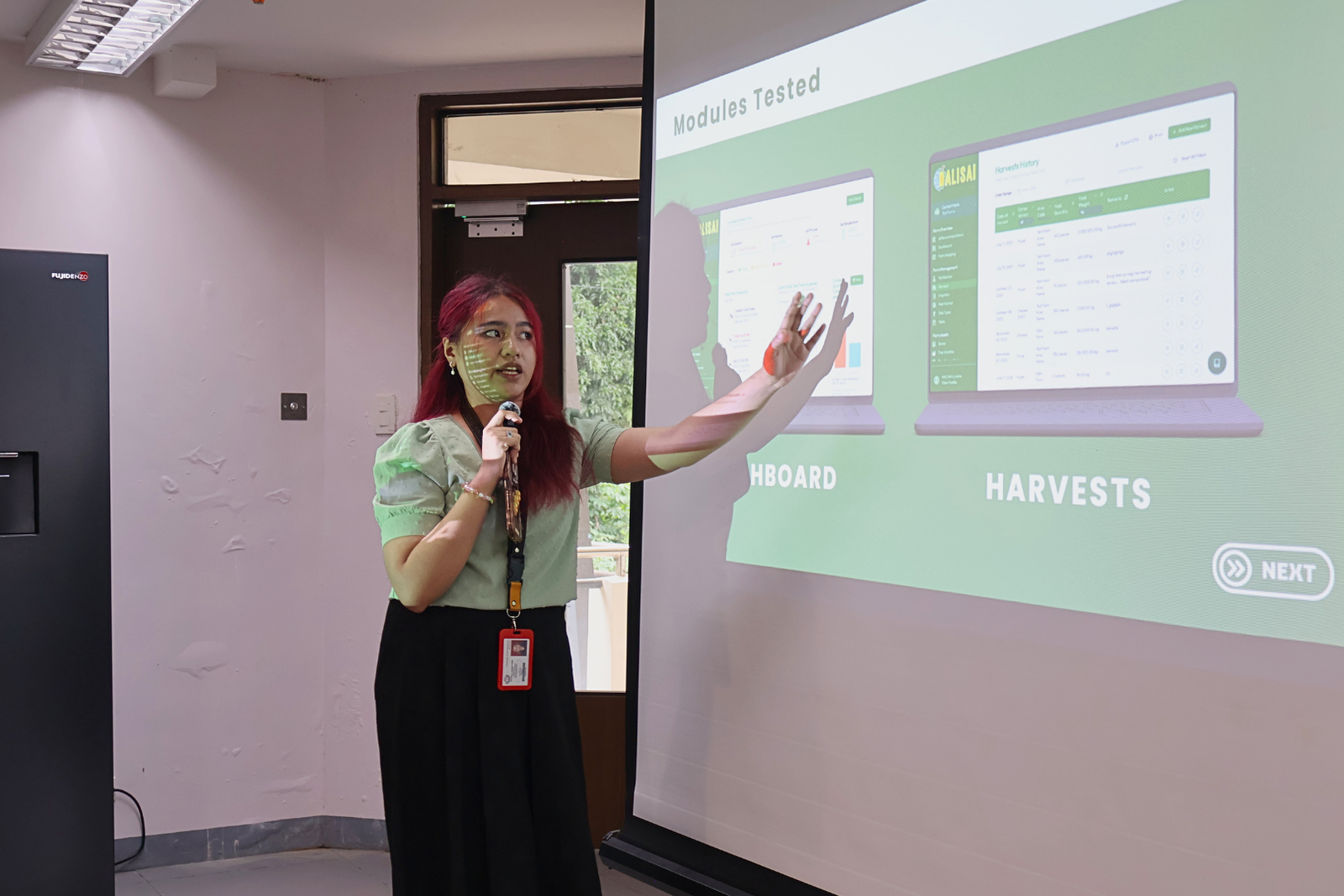 Interns responding to feedback during the final presentations